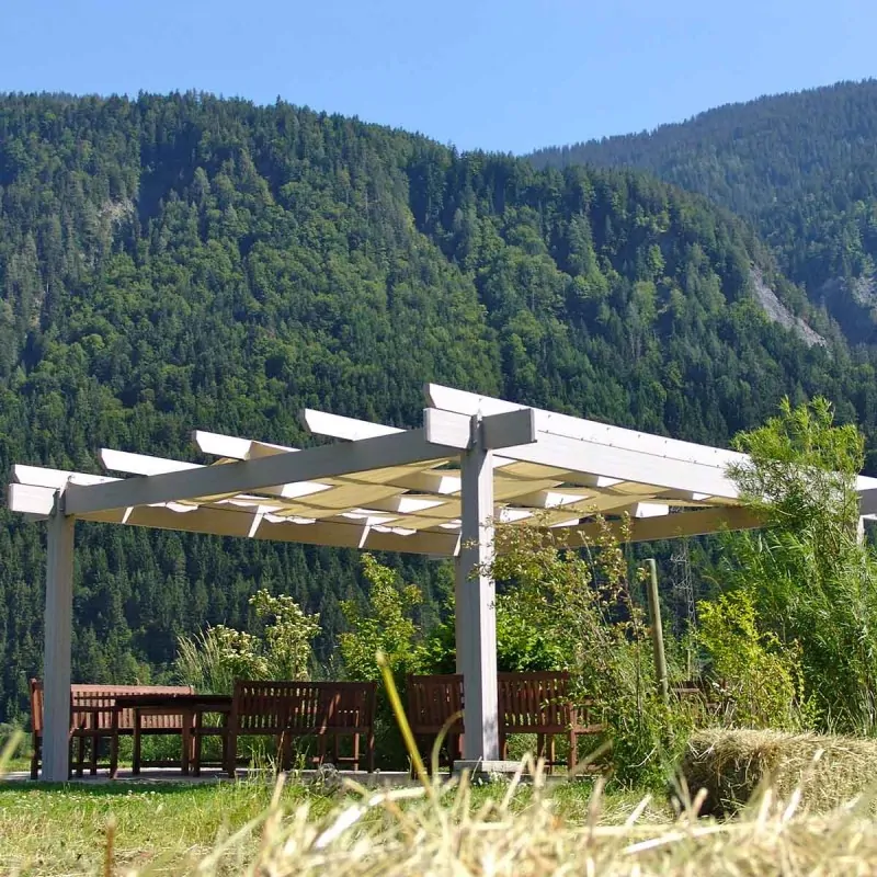 WPC pergola with fabric stripes