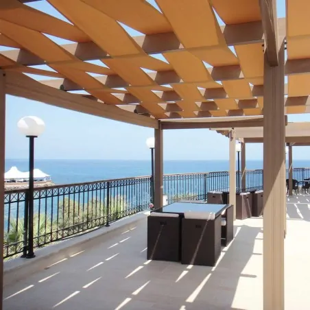 WPC pergola with fabric stripes WPC Pergola with Fabric Stripes | 300 x 300cm.