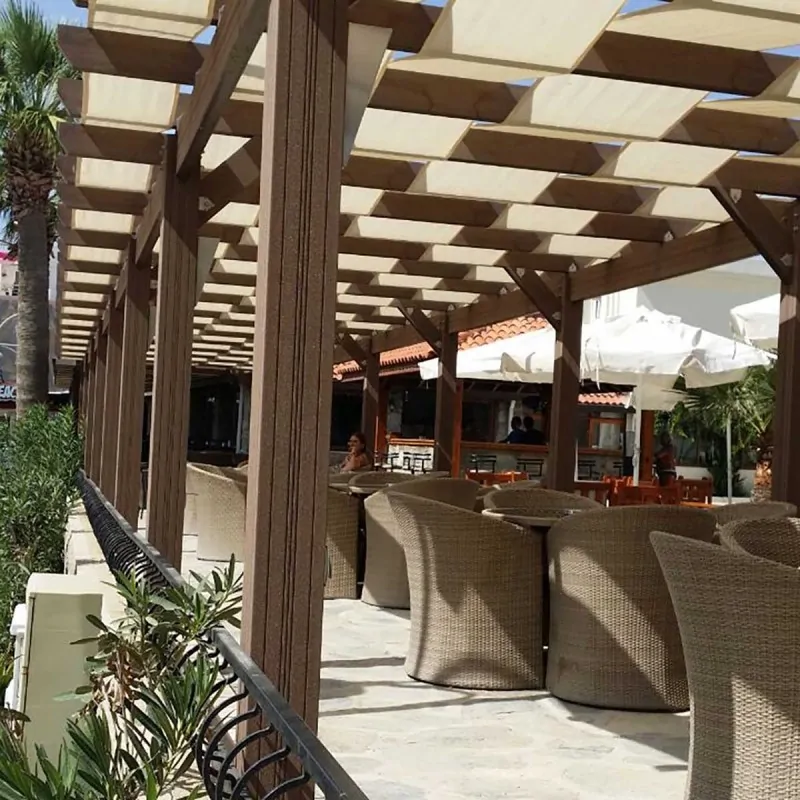 WPC wall pergola with fabric stripes